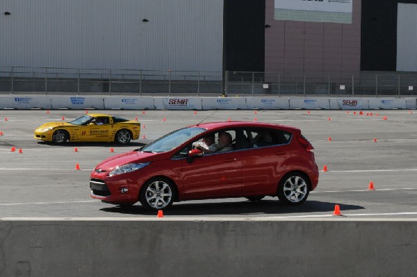 Bob Bondurant instructors take SEMA participants around SEMA MotorTrend Pro