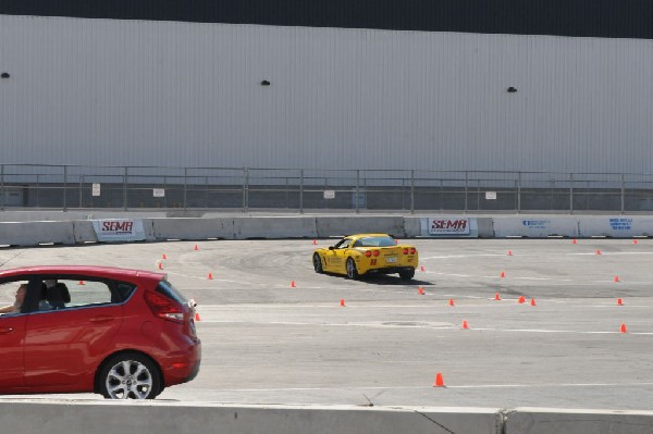 Bob Bondurant instructors take SEMA participants around SEMA MotorTrend Pro