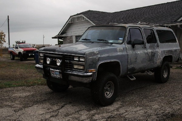 1990 Chevrolet Suburban being stripped for painting