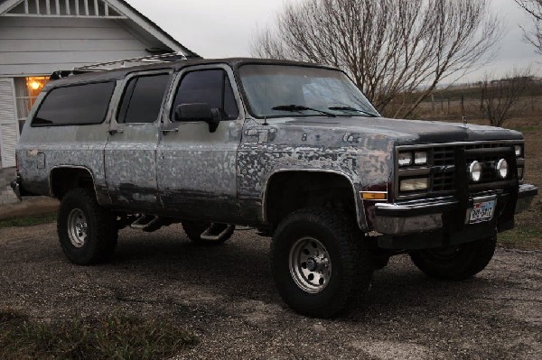 1990 Chevrolet Suburban being stripped for painting